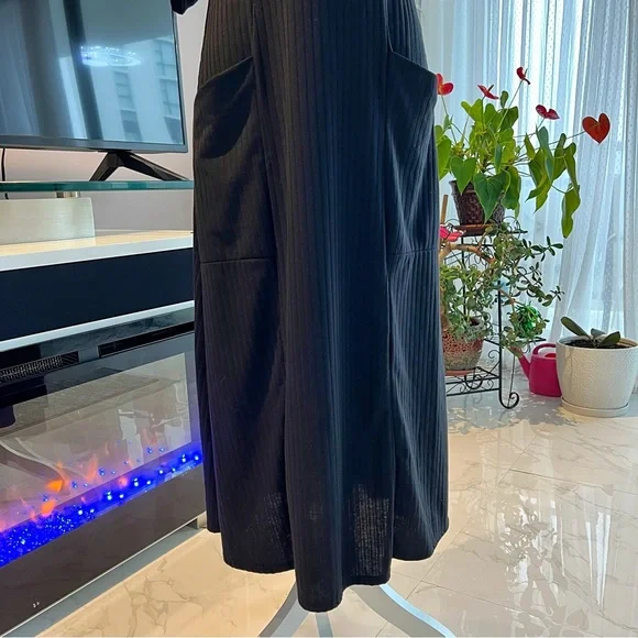 Rolla Coster Plunging Black Wrap Dress with
Flutter Sleeve Size: L - Picture 4 of 16